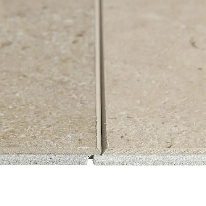 Grosfillex Wall+ Wandpaneel - Cream Slate, 600 x 300 x 5 mm, 11 Stk. - Nahaufnahme von miteinander verbundenen, beigen, strukturierten Verbundfliesen, die ein durchgehendes Muster für Bodenbeläge bilden.