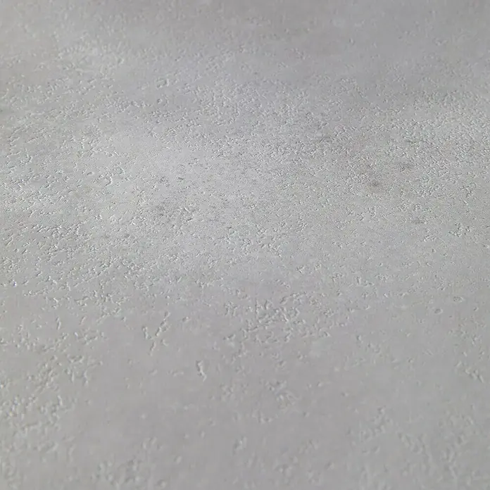 Grosfillex Wall+ Wandpaneel - Grey Cement, 900 x 450 x 5 mm - Nahaufnahme einer Betonoberfläche mit feiner Textur, ideal als neutraler Hintergrund für Produktpräsentationen.