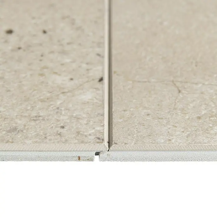 Grosfillex Wall+ Wandpaneel - Cream Slate, 900 x 450 x 5 mm - Nahaufnahme von zwei hellen Fliesen mit Fugenmörtel, die die Textur und Farbe der Fliesen hervorhebt.