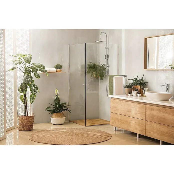 Grosfillex Wandpaneel Element Mineral Marmor grau - Marmor grau, 2.600 x 375 x 8 mm - Ein modernes Badezimmer mit einer ebenerdigen Dusche, einem Waschtisch aus Holz und vielen Zimmerpflanzen für eine natürliche Atmosphäre.