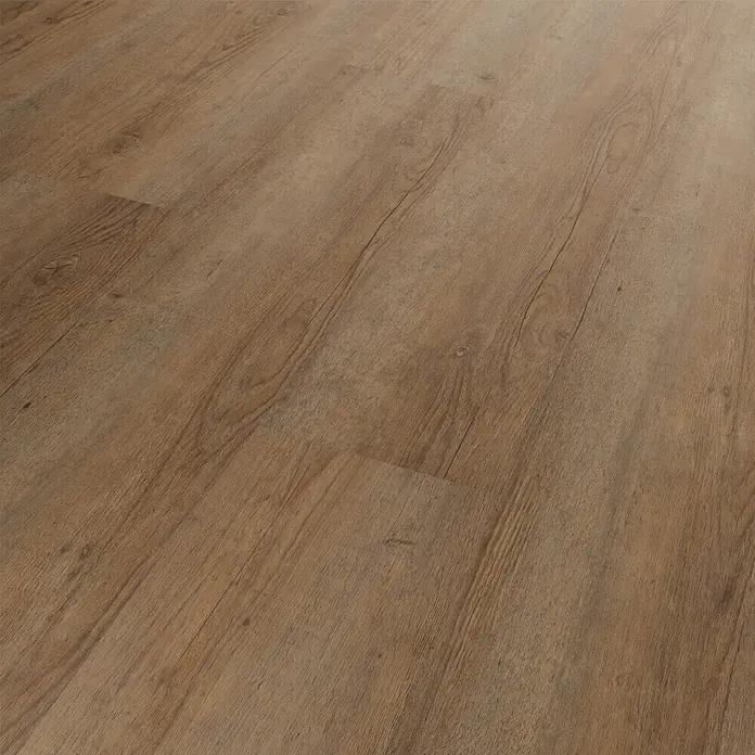b!design Vinylbodenmuster Rigid SPC Tundra Pinie - 281 x 161 x 3,8 mm, Landhausdiele - Detailaufnahme des Holzdielenbodens, der die natürliche Maserung und die warmen Farbtöne dieses robusten und stilvollen Bodenbelags hervorhebt.