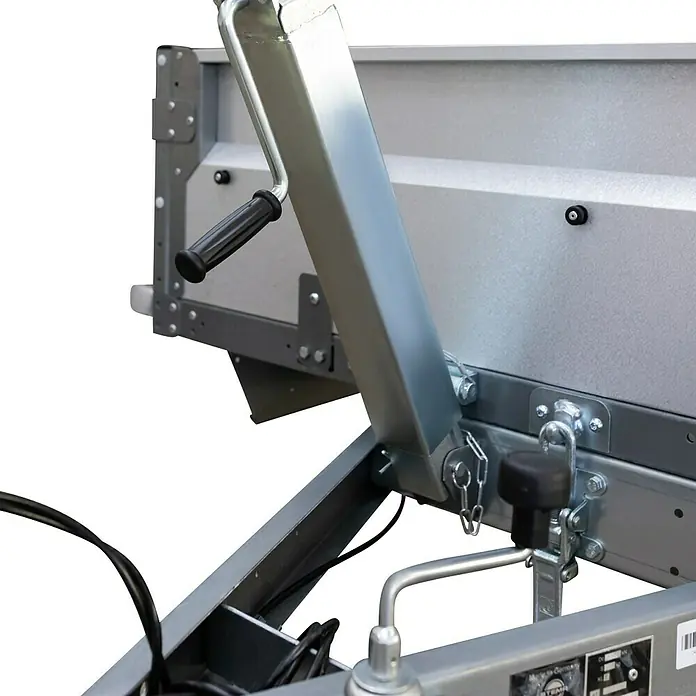 Stema Kippanhänger Rex 21 - Nutzlast: 525 kg, Einachser, Kasteninnenmaß: 210 x 128 x 35 cm, Ausführung: Ungebremst - Nahaufnahme eines Kippanhängers mit Handkurbel. Ideal für den Transport von Schüttgütern. Robuste Bauweise für den professionellen Einsatz.