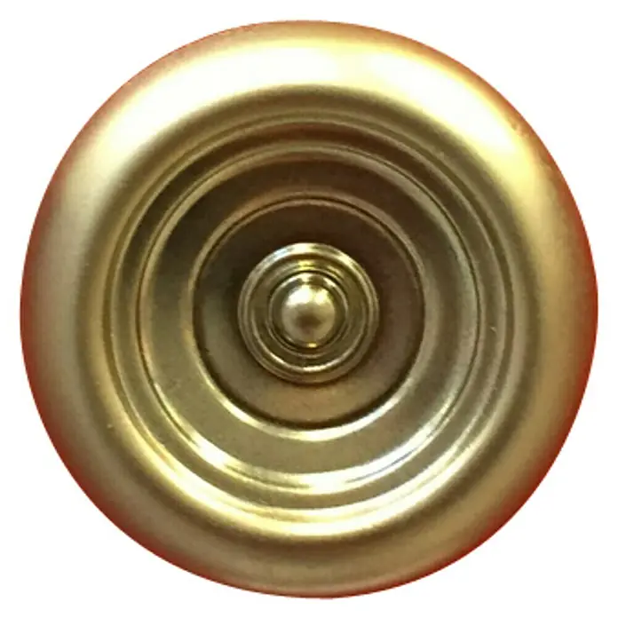 Häfele Pomo para muebles - Tipo de tirador del mueble: Botón, Ø x Al: 35 x 22 mm, Mate - Primer plano de un yo-yo dorado con círculos concéntricos, perfecto para juegos de habilidad y actos de malabarismo.
