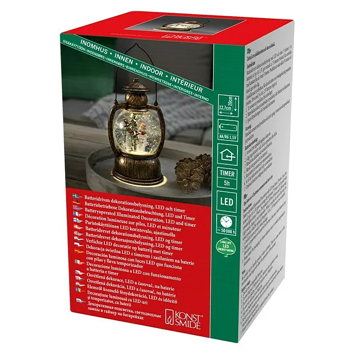 Konstsmide LED-Schneelaterne Schneemannfamilie - Innen, Braun, 12,7 x 10,8 x 20 cm, Schneemann, Batteriebetrieben - Produktverpackung einer LED-Schneekugel-Laterne mit Timerfunktion für eine stimmungsvolle Dekoration im Innenbereich.