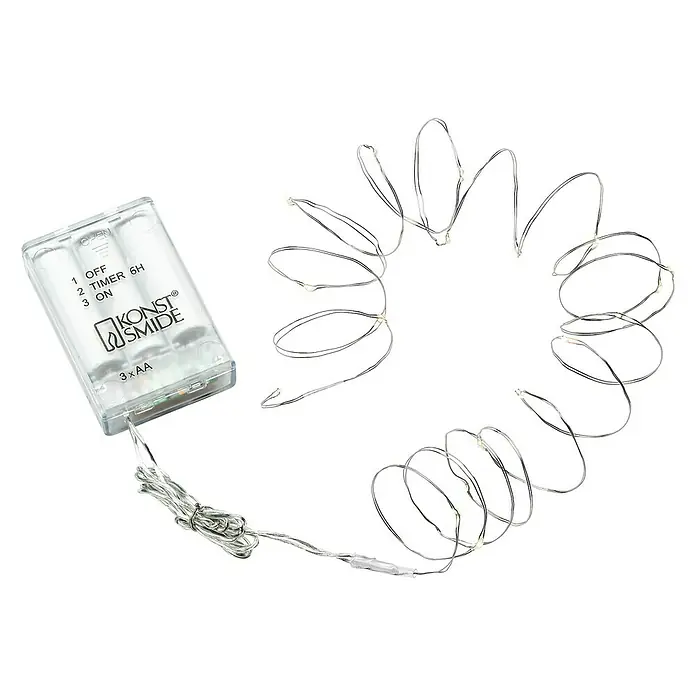 Konstsmide LED-Lichterkette - Innen, Lichtfarbe: Warmweiß, Anzahl Leuchtmittel: 20 Stk., Batteriebetrieben, Silber - LED-Lichterkette mit Batteriebetrieb für dekorative Beleuchtung im Innenbereich. Die Drahtlichterkette sorgt für eine gemütliche Atmosphäre.