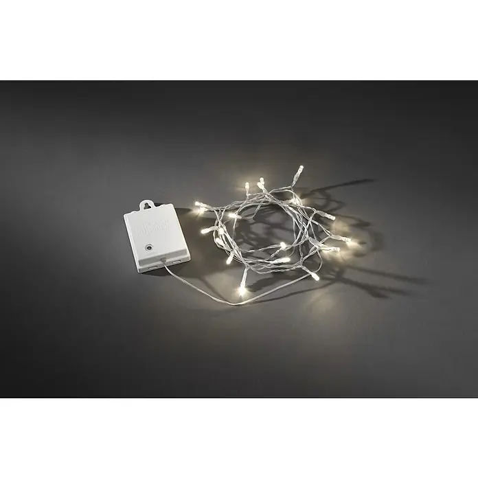 Konstsmide LED-Lichterkette - Außen, Lichtfarbe: Warmweiß, Anzahl Leuchtmittel: 80 Stk., Batteriebetrieben, Weiß - Festliche Lichterkette mit Batteriepack. Ideal für stimmungsvolle Dekorationen im Innenbereich, die warmes Licht verbreiten.