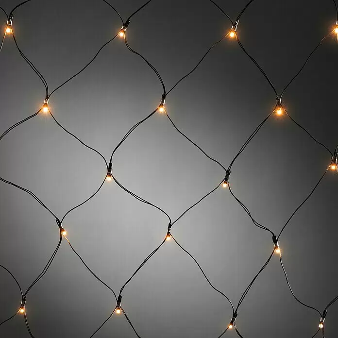 Konstsmide LED-Lichterkette - Innen, Lichtfarbe: Bernstein, Anzahl Leuchtmittel: 80 Stk. - Schwarzes Lichterkettennetz mit mehreren warmweiß leuchtenden Glühbirnen.