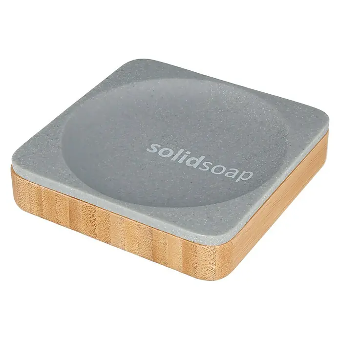 Venus Cooper Seifenschale - Polyresin, Grau - Eine quadratische Seifenschale aus grauem Stein mit "solidsoap"-Schriftzug auf einem Holzsockel, ideal für Badezimmer.