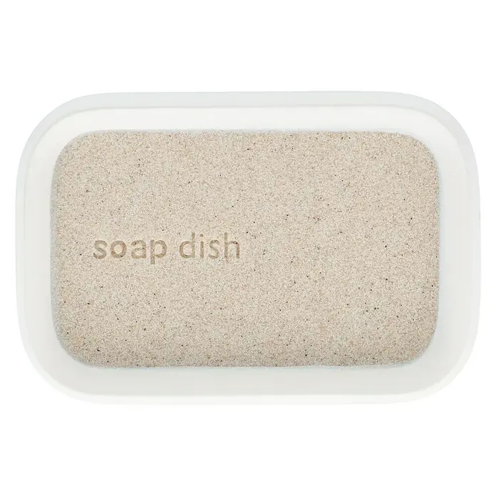 Venus Nara Seifenschale - Polyresin, Grau - Eine weiße Seifenschale mit der Aufschrift "soap dish", die ein modernes und minimalistisches Design zeigt.