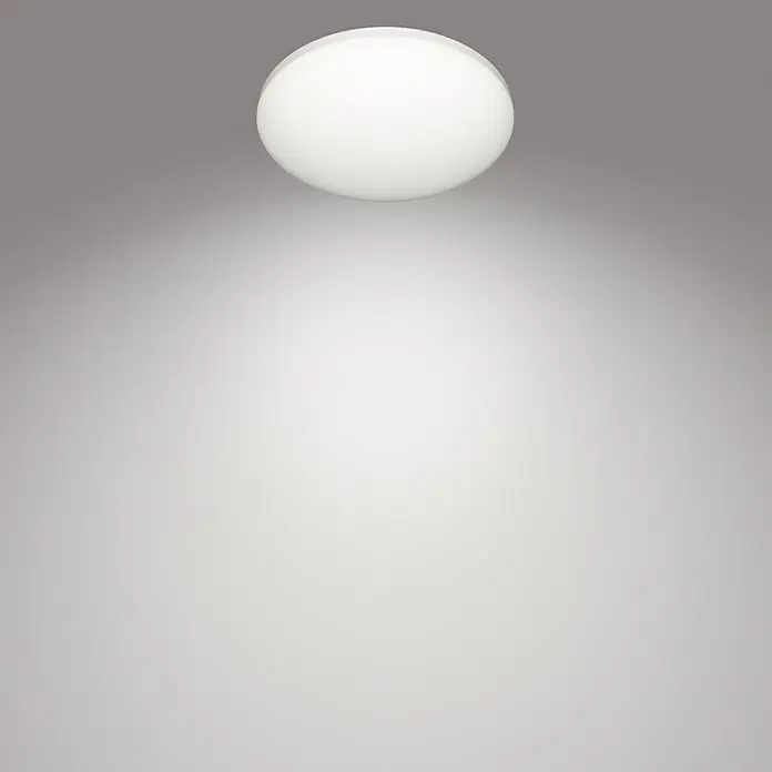 Philips Plafón LED redondo SceneSwitch - 15 W, Ø x Al: 250 mm x 2,3 cm, Blanco, Blanco neutro - Primer plano de una elegante lámpara de techo blanca, que muestra su diseño moderno y brinda una iluminación suave para cualquier habitación.