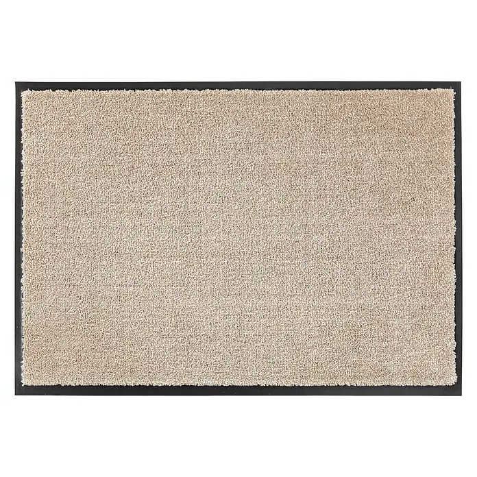 SCHÖNER WOHNEN-Kollektion Fußmatte Uni - Beige, 150 x 67 cm - Ein rechteckiger Fußabtreter mit beiger Textur und einem robusten, schwarzen Rand, ideal für den Eingangsbereich, um Schmutz effektiv aufzufangen.