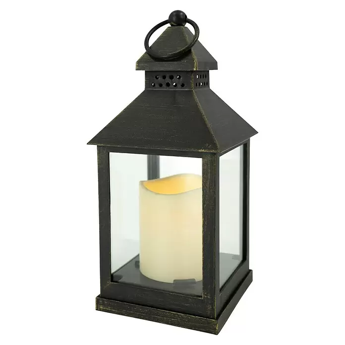 LED-Laterne - 10 x 10 x 24,5 cm, Schwarz - Antik bronzefarbene Laterne mit Glaspaneelen und einer cremefarbenen LED-Kerze, oben mit Griff.