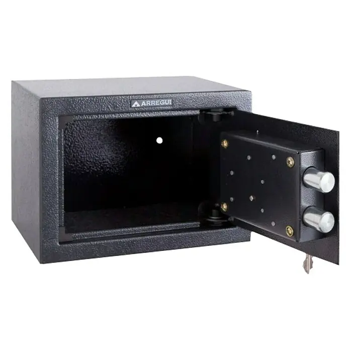 Arregui Caja fuerte T-17K - L x An x Al: 17 x 23 x 17 cm, Tipo de bloqueo: Cerradura de seguridad con doble paletón - Caja fuerte abierta marca Arregui de color oscuro con pernos plateados. Adecuada para guardar objetos de valor con seguridad.