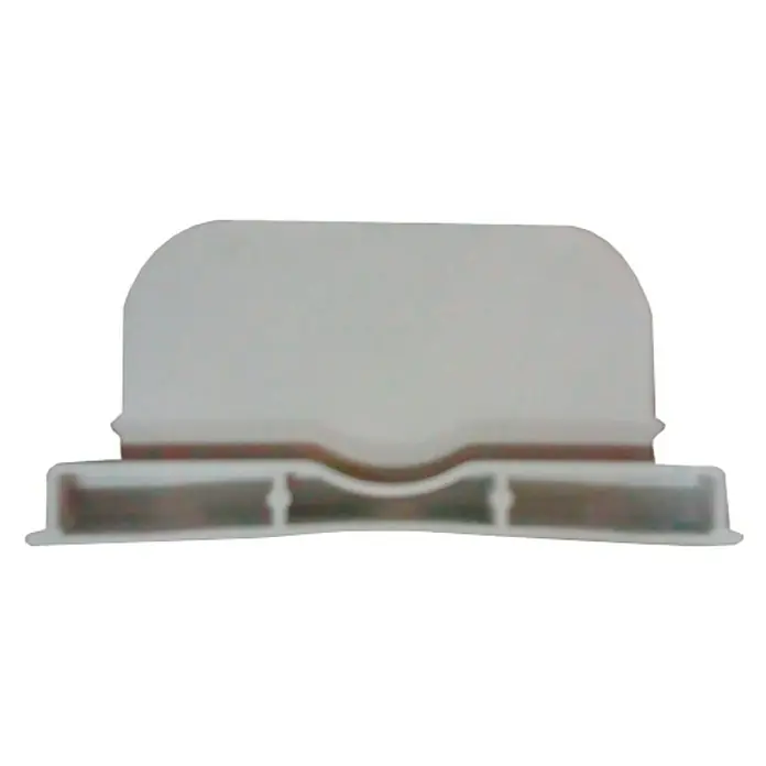 Dakota Tapa para canaleta Pegasus Plus - Gris - Componente de plástico gris con parte superior redondeada y base rectangular con tres recortes, ideal para diversas aplicaciones.