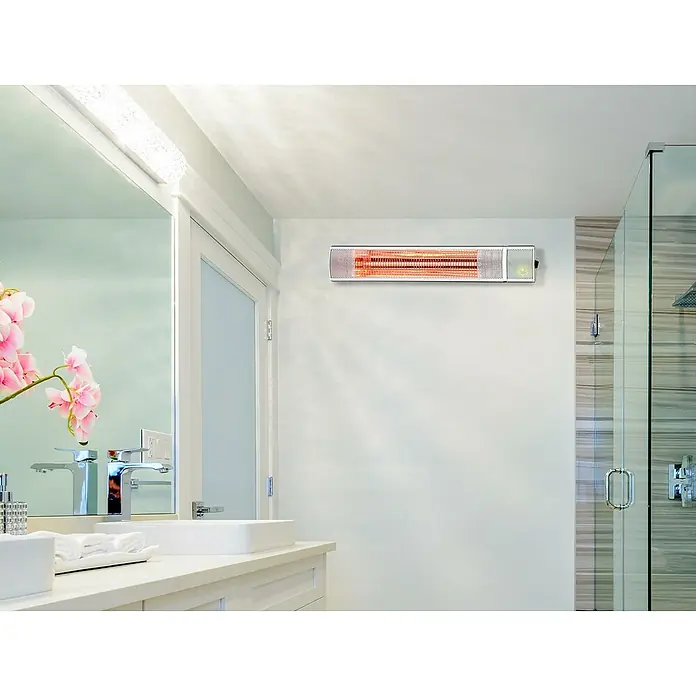 Purline Calefactor halógeno Heaty EX2000 RC - 10,5 x 63 x 15 cm - La imagen muestra un calentador infrarrojo moderno en una pared de baño, proporcionando un calor agradable. El calentador añade un toque elegante.