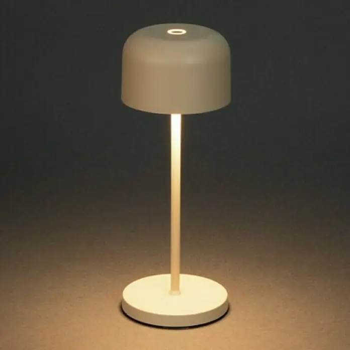 Konstsmide Akku-Tischleuchte Lille Mini - 2,5 W, L x B x H: 7,5 x 7,5 x 20 cm, Sand, Mehrfarbig - Tischleuchte mit rundem Sockel und Schirm. Das Licht scheint sanft durch den Schirm und erhellt den Raum mit einem warmen Schein.