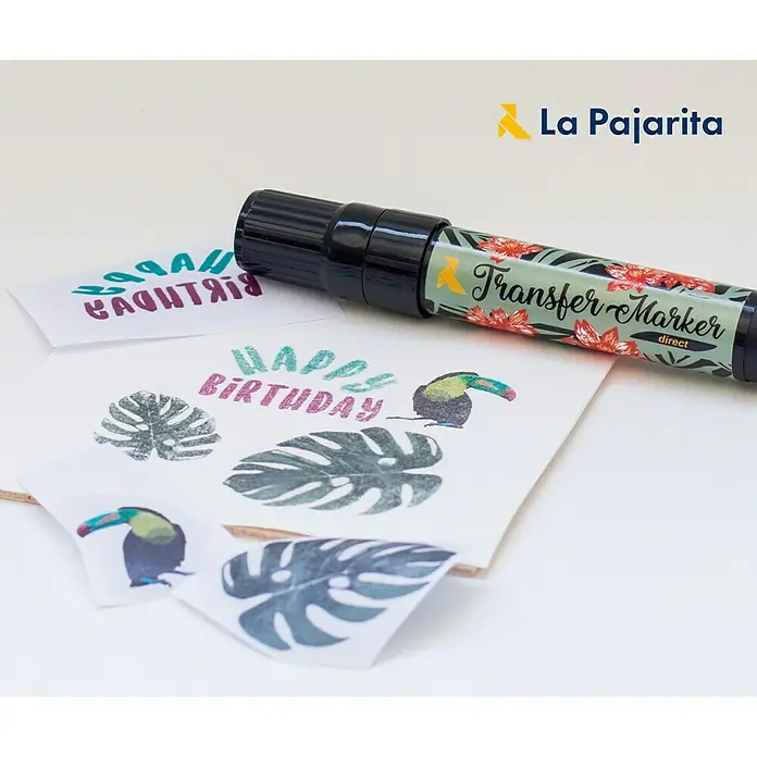 La Pajarita Marcador para ropa Transfer market direct - Incoloro - Primer plano de un La Pajarita Transfer Marker Direct con un diseño floral, junto con un surtido de diseños creados con él sobre papel.