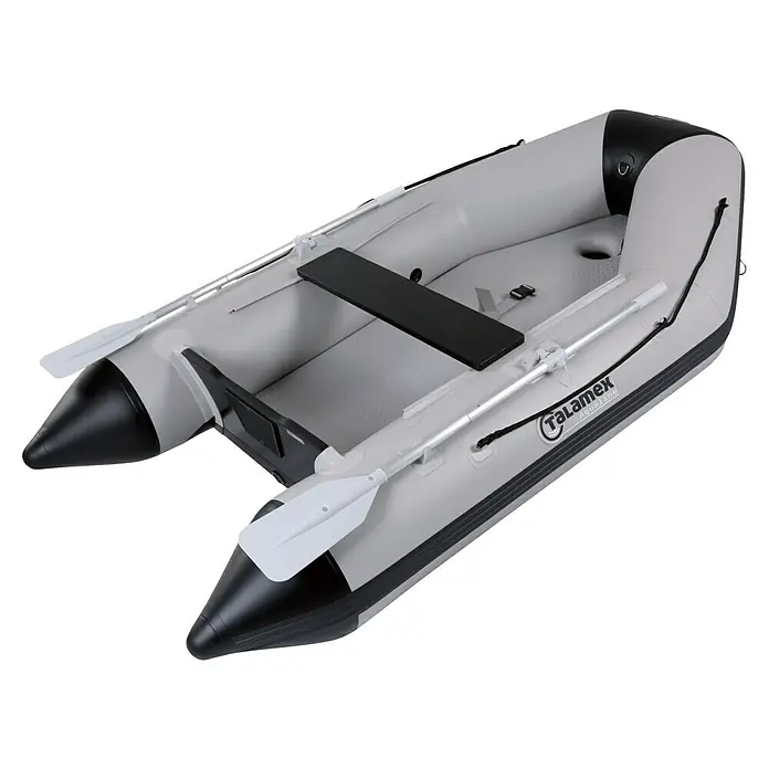 Talamex Schlauchboot Luftboden Aqualine QLA270 - L x B: 270 x 152 cm, Tragkraft: 410 kg, Geeignet für: 3 Personen - Ein graues Talamex Aqualine Schlauchboot mit schwarzen Akzenten und Paddeln, ideal für Wassersport und Freizeitaktivitäten.