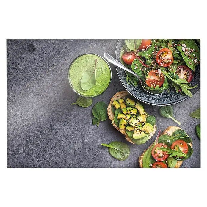 CUCINE Küchenrückwand - Fresh Avocado, 60 x 40 cm, Stärke: 6 mm, Einscheibensicherheitsglas (ESG) - Nahaufnahme von Toast mit Avocado, Salat und einem grünen Smoothie, die eine gesunde und farbenfrohe Mahlzeit präsentieren.