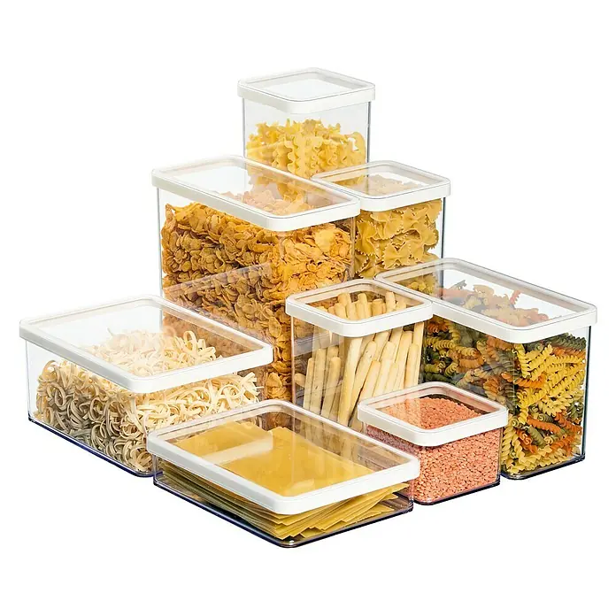 Rotho Vorratsdose Loft - L x B x H: 20 x 10 x 21,4 cm, Kunststoff, Transparent - Verschiedene Arten von Nudeln und Getreide in durchsichtigen Vorratsbehältern mit weißen Deckeln, ideal für die Küchenorganisation.