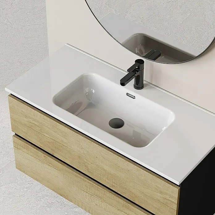 Artysan Conjunto de mueble de baño Bico - Ancho: 100 cm, Nature/Nergo, 3 pzs. - Primer plano de un tocador moderno con cajones de madera, una encimera blanca y un elegante grifo negro.