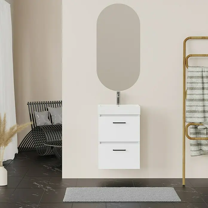 Artysan Conjunto de mueble de baño Palma 2C - Ancho: 45 cm, Blanco, 3 pzs. - Un baño moderno con un mueble de lavabo flotante en blanco, coronado con un espejo ovalado. Un toallero y decoraciones completan el diseño.