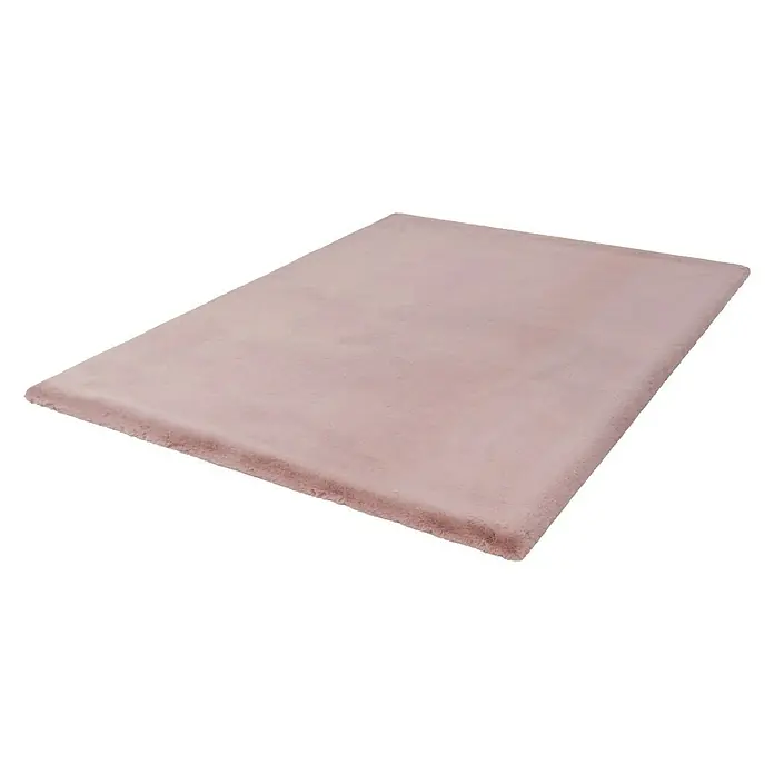 Fellteppich Happy - Rosa, 170 x 120 cm, 100 % Polyester (Flor) - Ein flauschiger, rosa Teppich. Der Teppich ist rechteckig und hat eine weiche, zottelige Textur.
