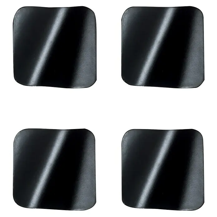 Rei Pomo para muebles - L x An: 33 x 33 mm, Negro, Mate, 4 ud. - Primer plano de cuatro almohadillas de gel negras para la cara, utilizadas para tratamientos cosméticos o aplicaciones para el cuidado de la piel.