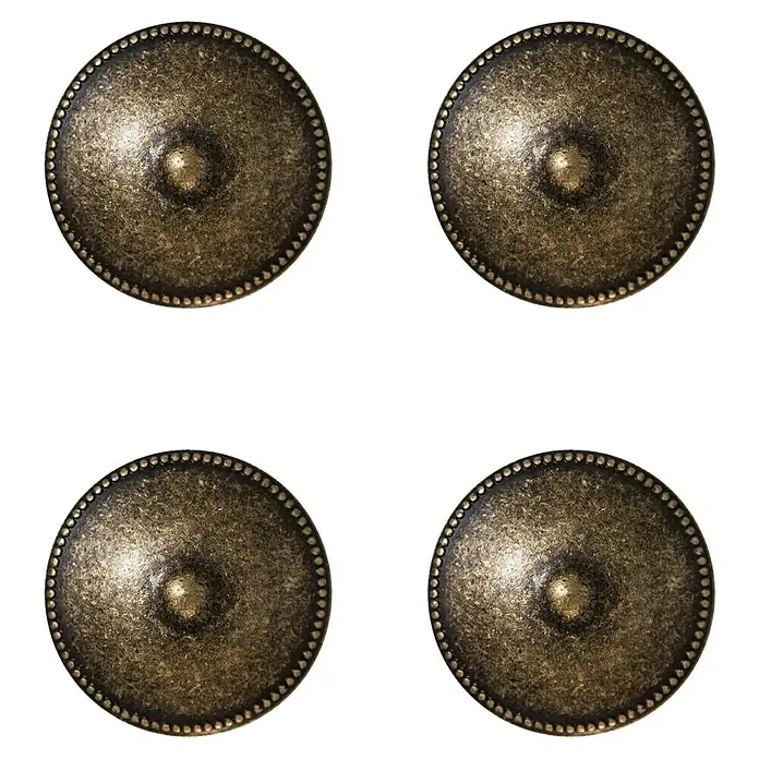 Rei Pomo para muebles 3121 - Diámetro: 30 mm, Cuero viejo, 4 ud. - Primer plano de cuatro botones decorativos en tono bronce con un acabado envejecido y rústico y un borde de puntos decorativo.