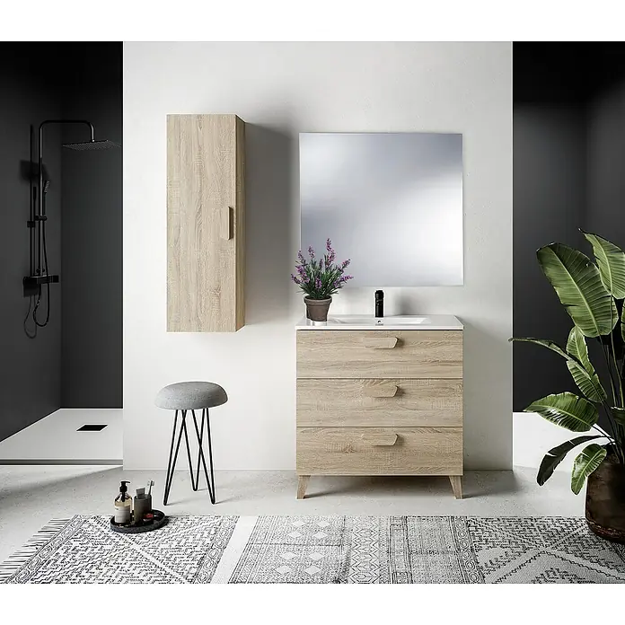 Conjunto de mueble de baño Sofía - 80 cm, Roble bardolino, 3 pzs. - Interior de baño con un mueble de lavabo de madera clara con tres cajones, un armario colgante y un espejo cuadrado.