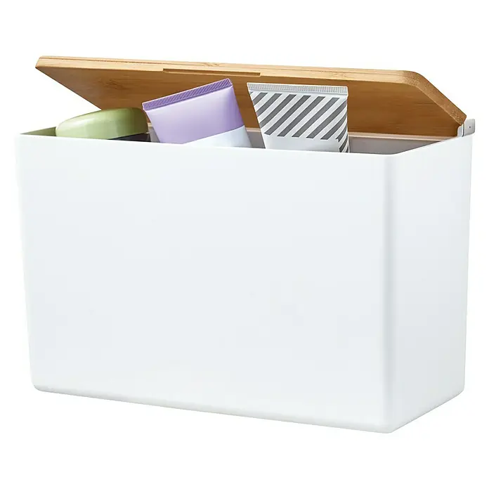 Tesa Aufbewahrungsbox Baboo - L x B x H: 24,2 x 10,2 x 16 cm, ABS-Kunststoff, Weiß/Bambus - Aufbewahrungsbox mit Holzdeckel, gefüllt mit Badartikeln. Das schlichte Design macht es zu einer stilvollen Ergänzung für jedes Badezimmer.