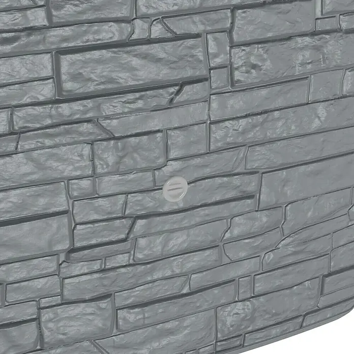 Arves Regenspeicher Multitank - 250 l, Betonoptik, 1 Stk. - Nahaufnahme einer grauen Steinwand mit einem einzelnen, versenkten, runden Objekt, das einen subtilen Kontrast in der Textur bietet.