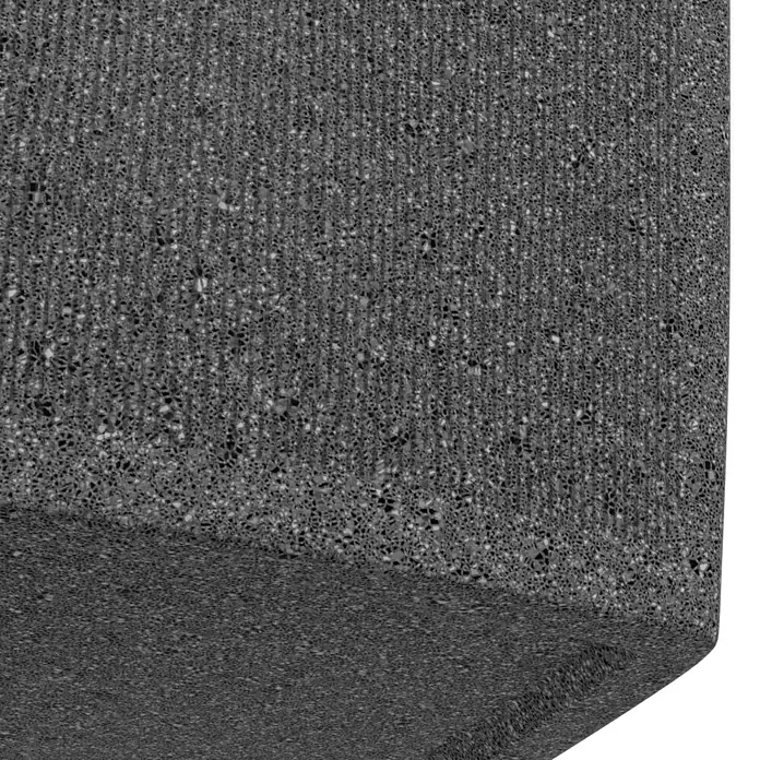 Arves Regenspeicher Boxy - 270 l, Granitkörnung, 1 Stk. - Nahaufnahme eines grauen Betonblocks mit rauer Textur, der seine robuste und industrielle Beschaffenheit hervorhebt.