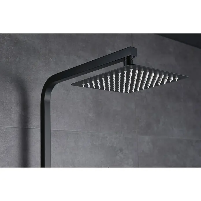 Imex Suecia Sistema de ducha - Con grifo monomando, Negro - Ducha de lluvia negra con cabezal cuadrado y diseño minimalista contra una pared gris para baños modernos.