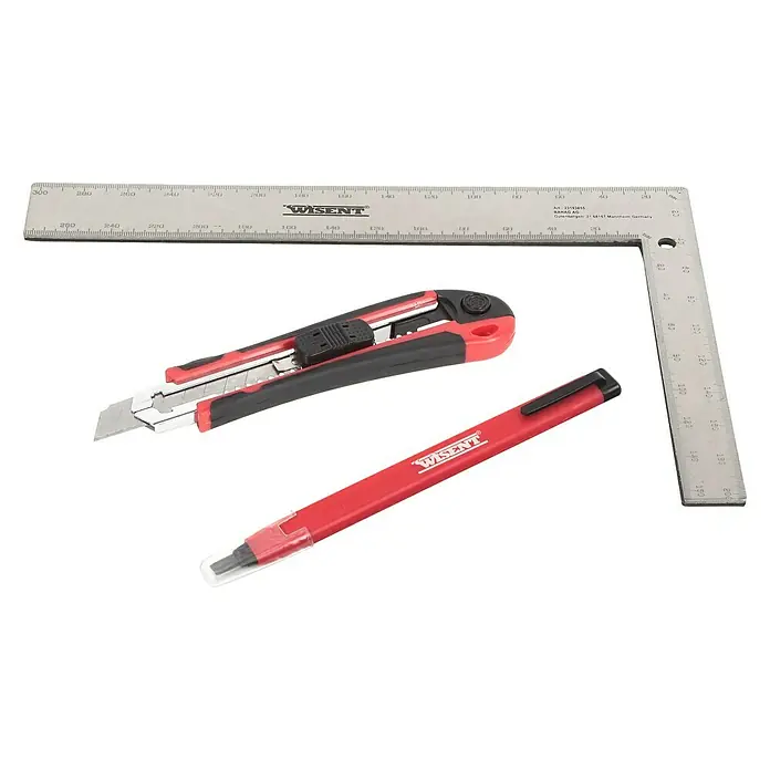 Wisent Verlege- & Anreißsatz - 3 -tlg. - Das Bild zeigt ein Wisent-Set mit einem Cutter, einem Winkel und einem Stift, ideal für präzise Arbeiten.