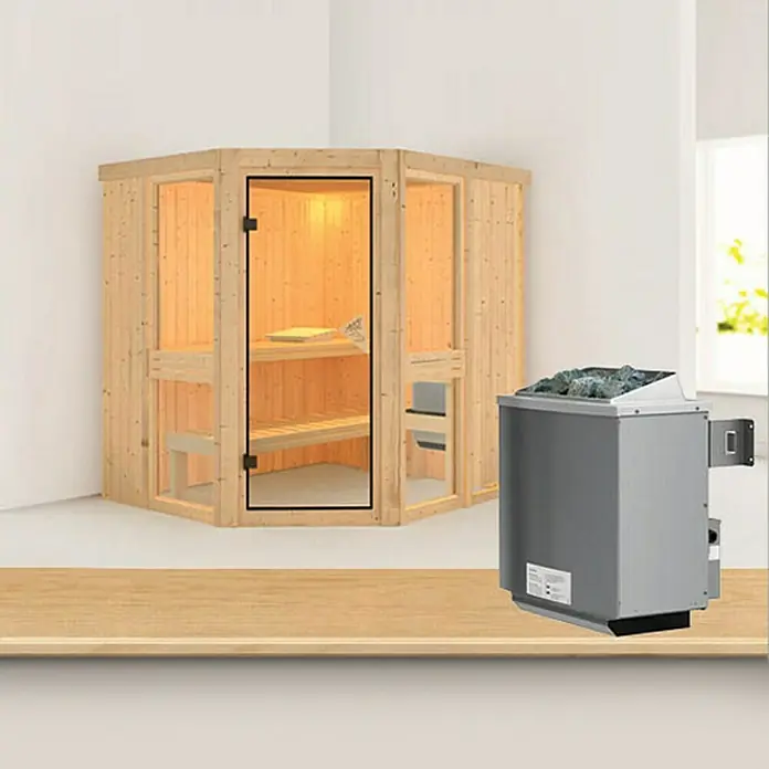 Karibu Elementsauna Amelia 1 - Mit 9 kW Ofen mit integrierter Steuerung, Ohne Dackranz, L x B x H: 196 x 170 x 192 cm - Ein luxuriöses Sauna-Set mit einer hellen Holzkabine und einem grauen Saunaofen, perfekt für Entspannung und Wohlbefinden.