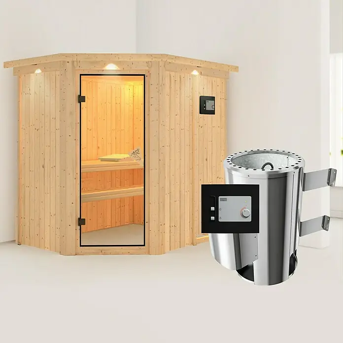 Karibu Massivholzsauna Saja - Mit 3,6 kW Ofen mit externer Steuerung, Mit Dachkranz und Beleuchtung, L x B x H: 165 x 210 x 192 cm - Produktabbildung einer Ecksauna aus Holz mit Glastür und einem Saunaofen mit Steuerung.