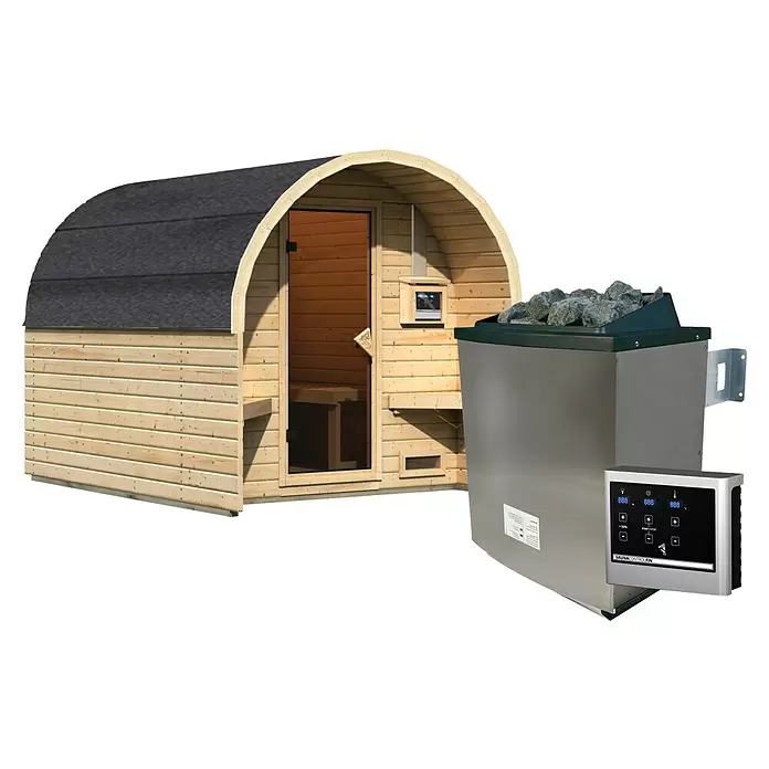 Karibu Fasssauna - L x B x H: 295 x 219 x 229 cm, 9 kW Saunaofen mit externer Steuerung - Fassförmige helle Holzsauna mit schwarzem Dach, daneben ein metallener Saunaofen mit Steinen und digitalem Bedienfeld.