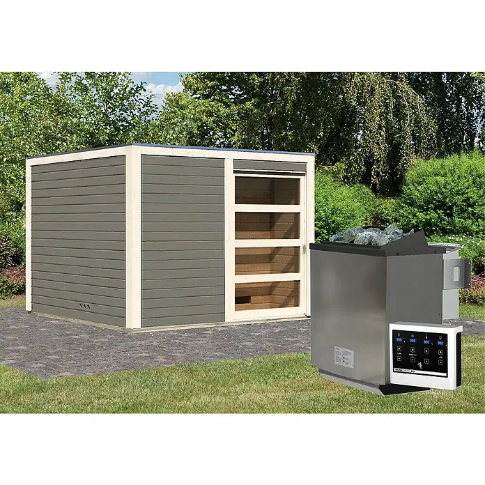 Karibu Saunahaus Cuben - 9 kW Bio-Saunaofen mit externer Steuerung, Terragrau, L x B x H: 276 x 276 x 210 cm - Außenansicht einer modernen Gartensauna mit grauem Holz und einer Heizung. Die Sauna verfügt über eine Schiebetür mit transparenten Elementen.