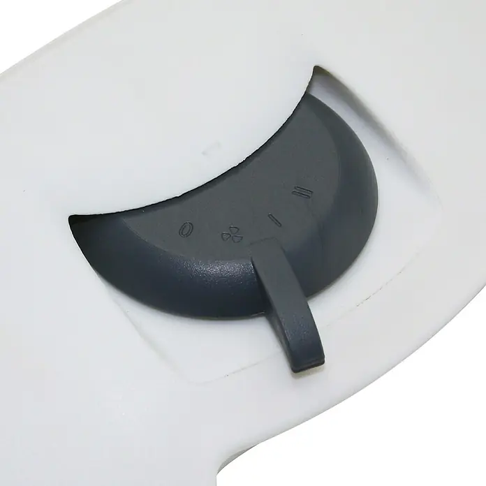 Voltomat HEATING Heizlüfter Globe - 1.000 W - 2.000 W, Grau - Nahaufnahme eines weißen Gerätes mit einem grauen Schalter zur Einstellung der Gebläsestufe von 0 bis II.