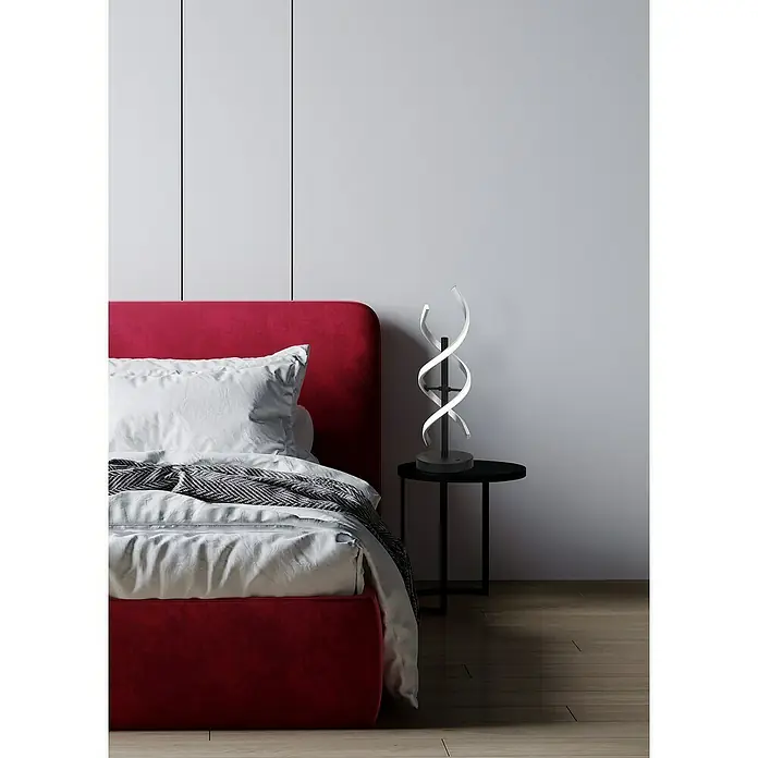 Trio Leuchten Sequence LED-Tischleuchte - 20 W, Aluminium gebürstet/Schwarz, Mehrfarbig - Elegante Nachttischlampe mit spiralförmigem Design auf einem modernen Schlafzimmertisch, perfekt für stilvolle Beleuchtung.