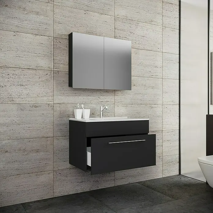 VCM Badinos Badmöbel-Set SPS - 60 cm, Schwarz - Modernes Badezimmer-Waschbecken mit schwarzem Unterschrank, weißem Aufsatzwaschbecken und Spiegelschrank an einer grauen Wand.