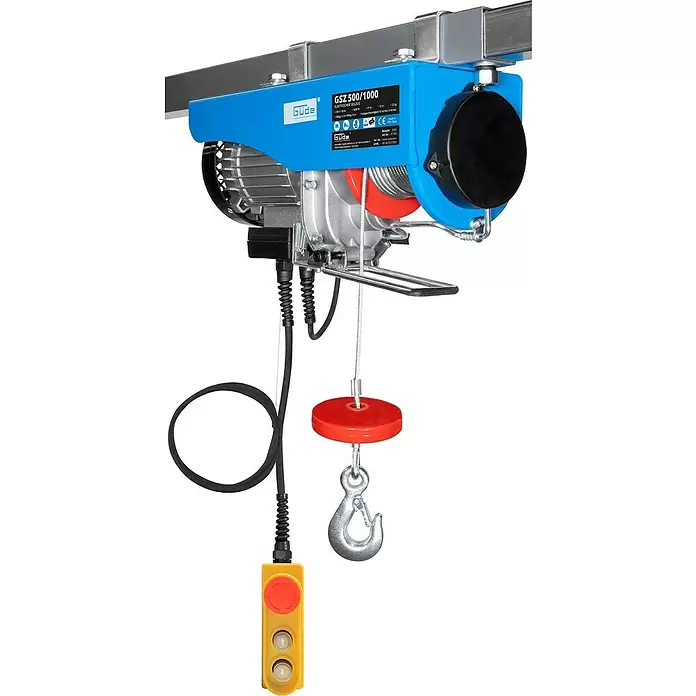 Güde Elektro-Seilhebezug GSZ 500/1000 -  - Blauer und silberner elektrischer Seilzug an einem Metallträger, mit Stahlseil, rotem Haken und gelber Kabelfernbedienung.