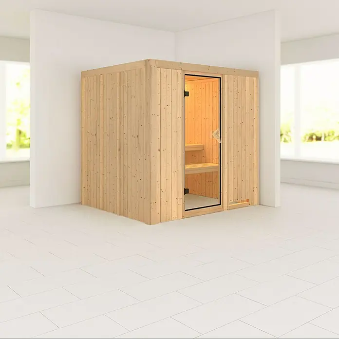 Karibu Elementsauna Sodin - Ohne Ofen, Ohne Dachkranz, L x B x H: 196 x 170 x 192 cm - Diese Aufnahme zeigt eine Sauna aus hellem Holz, die in einem hellen, modernen Raum steht. Das Design ist schlicht und funktional.