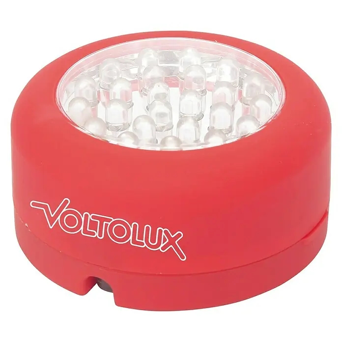 Voltolux LED-Arbeitsleuchte mit Magnethalterung - Mit Magnet, Batteriebetrieben - Das Bild zeigt eine rote Voltolux LED-Leuchte. Das Produkt ist kompakt und rundlich mit mehreren LEDs oben.