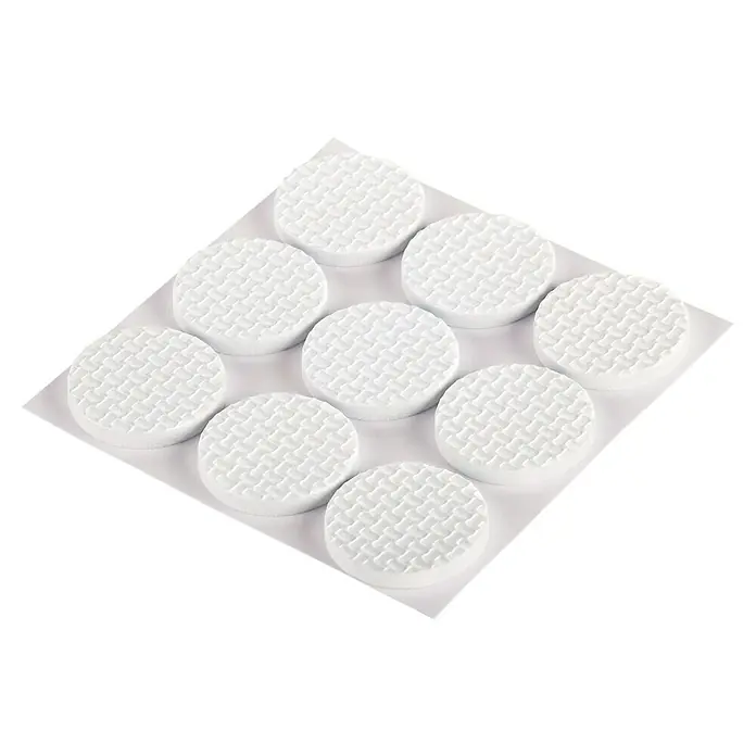 Fix-o-moll Gummiauflage - Durchmesser: 28 mm, 9 Stk. - Nahaufnahme von neun runden, weißen, strukturierten Pads auf einer quadratischen weißen Oberfläche.