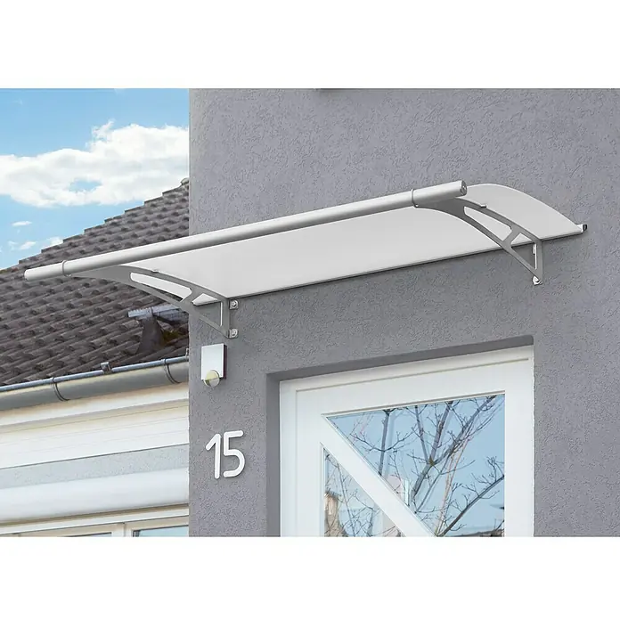 Gutta Pultvordach PT/L - 150 x 95 x 17 cm, Edelstahl, Farbe Dach: Weiß satiniert - Vordach mit weißer Abdeckung und silberfarbenem Rahmen über einer Haustür mit Hausnummer 15.