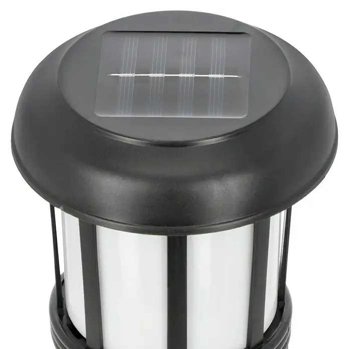 BAUHAUS Solarleuchten-Set - 0,1 W, L x B x H: 12,1 x 12,1 x 131 cm, Schwarz, 1,5 lm - Nahaufnahme einer Solarleuchte mit schwarzem Gehäuse und weißen Einsätzen, die eine moderne und energieeffiziente Beleuchtungslösung darstellt.