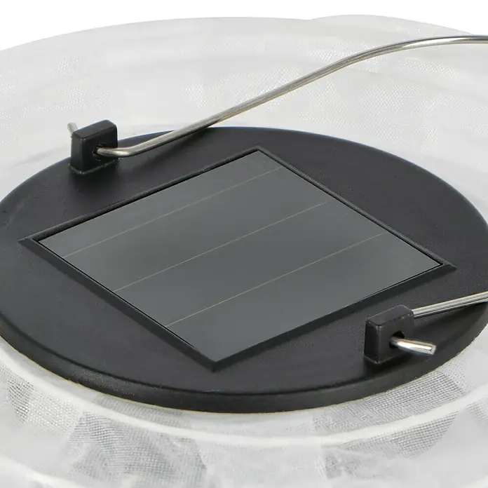 BAUHAUS Solar-Hängeleuchte Lampion - 0,06 W, Weiß, IP44, Durchmesser: 20 cm - Nahaufnahme einer Solarleuchte mit quadratischem Solarpanel, schwarzer Basis und Metallbügel zum Aufhängen.
