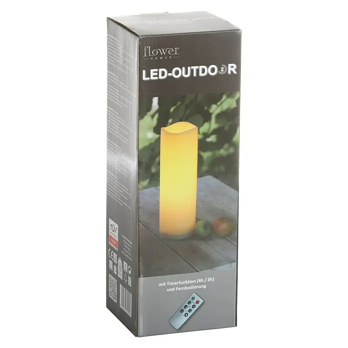 Flower Power Vela LED para exteriores Media - Ø x Al: 10 x 30 cm, Crema, Plástico - Embalaje del producto de una vela LED para exteriores Flower Power, con función de temporizador y mando a distancia.